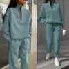 0dbb4e06e139c37bd70e37a344e86f901ed919cf701f9c08c26134e070f55d6d Sweatshirt and sweatpants two-piece suit