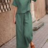23e22b6902b173bf306a50b556a2f32a5d0ab3568eb12aa4eec0c17e0899e709 Loose Solid Color Shirt and Trousers Two-piece Set
