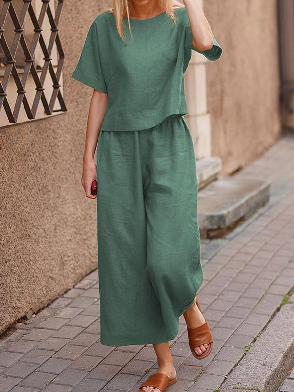 23e22b6902b173bf306a50b556a2f32a5d0ab3568eb12aa4eec0c17e0899e709 Loose Solid Color Shirt and Trousers Two-piece Set