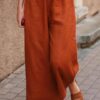 2dec86d941e1a1a981ae1580a545d90f8b52969aa923759ef0ab871a0679fae1 Loose Solid Color Shirt and Trousers Two-piece Set