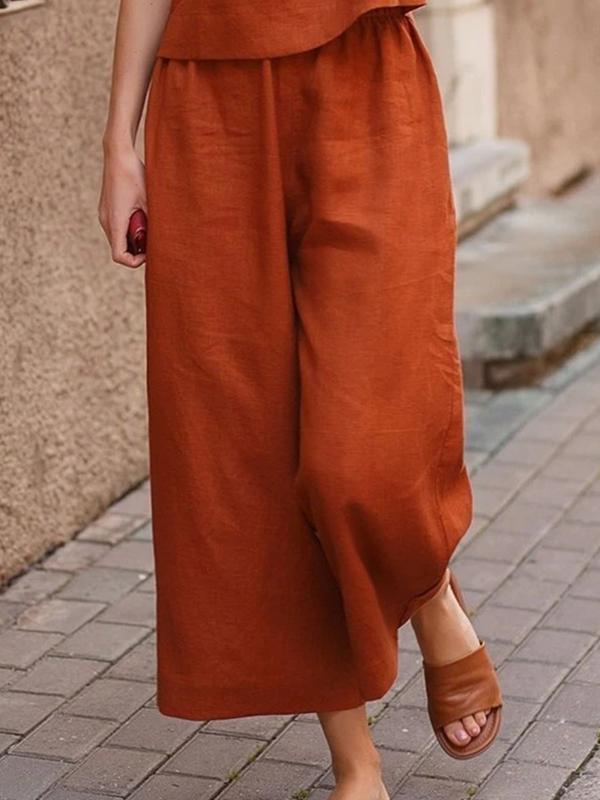 2dec86d941e1a1a981ae1580a545d90f8b52969aa923759ef0ab871a0679fae1 Loose Solid Color Shirt and Trousers Two-piece Set