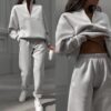 545fa04fc233a4907bcbe6e59f3e79c91437af794f9eee5fe68c795fc7d4710a Sweatshirt and sweatpants two-piece suit