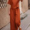 54a814ca5d1ea591b067c5e3f266cc9adebd8e05560d868889b2ec7b3e36bcb0 Loose Solid Color Shirt and Trousers Two-piece Set