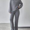 77db6239c4222d20bec99ff429ed953d4fc9d08a10c5aa684e47310ed968b537 Knitted Sweater With Zipper And Knitted Pants Set With Dropped Shoulders