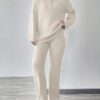 8049ea097a817b174b6580180e9f8ff0fdb63c8bca2fb176b9604bad85caa5df Knitted Sweater With Zipper And Knitted Pants Set With Dropped Shoulders
