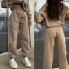 a42a55e8207644a92b9796babbd5495b544e5d95cb239f3f1aec8ca073a3b2ef Sweatshirt and sweatpants two-piece suit