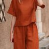 a94574fb0771e36c71718543d357d131f42459e6d0e33ffb240cd7f1b8bcef45 Loose Solid Color Shirt and Trousers Two-piece Set