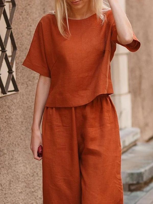 a94574fb0771e36c71718543d357d131f42459e6d0e33ffb240cd7f1b8bcef45 Loose Solid Color Shirt and Trousers Two-piece Set