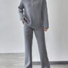 bdffbcba0729d7c257b97132a975a2b70821358d25fba6ac7969f63658462cfe Knitted Sweater With Zipper And Knitted Pants Set With Dropped Shoulders
